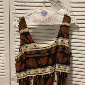 Gorgeous, mid drift dress. The most compliments I have ever received.